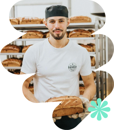 Photo d'un boulanger travaillant chez Maison Dandoy
